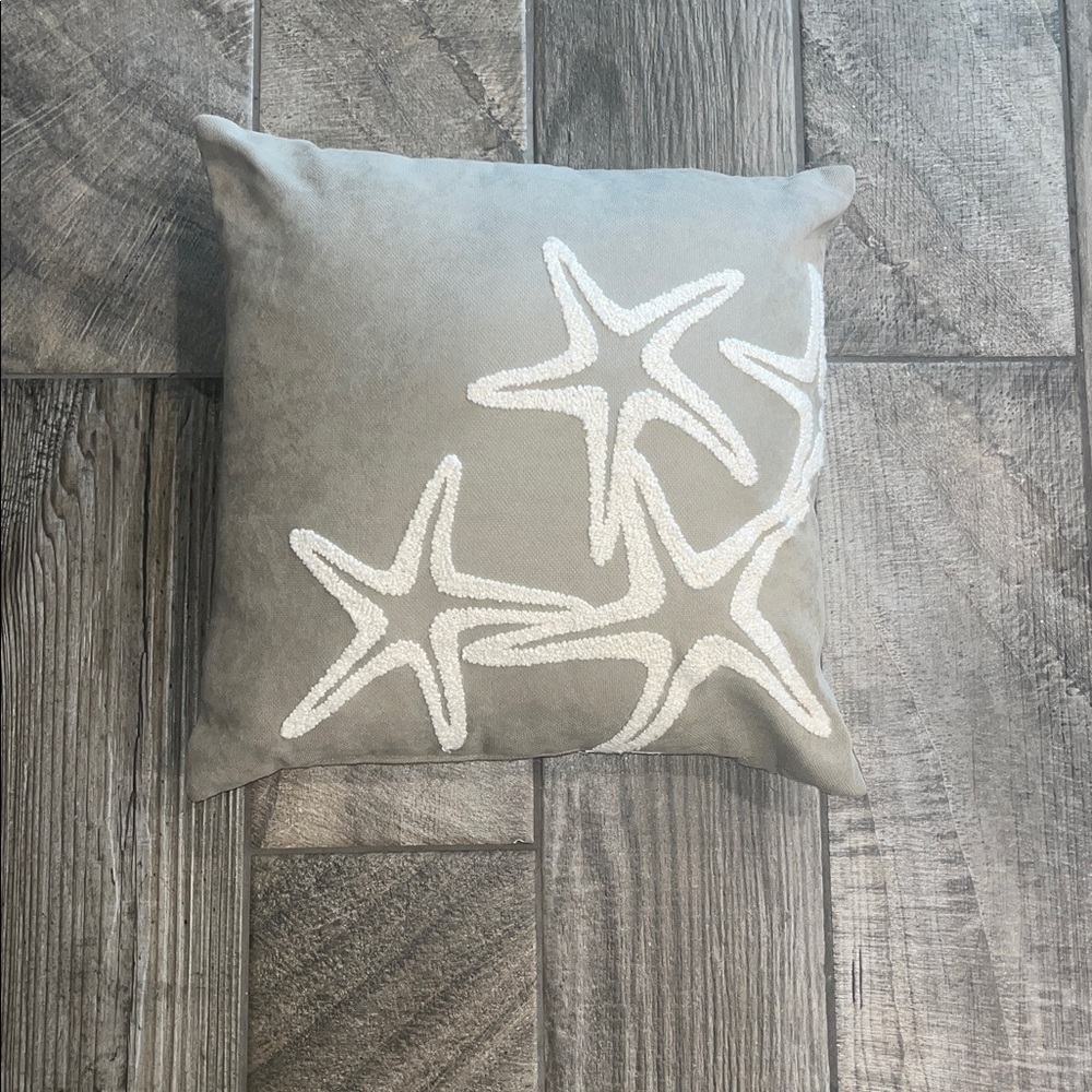 Tan Pillow with White Starfish Design 17”x 17”.
